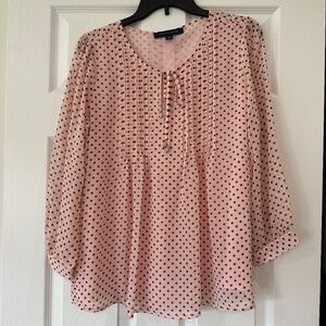 Chic pink blouse with polka dots
